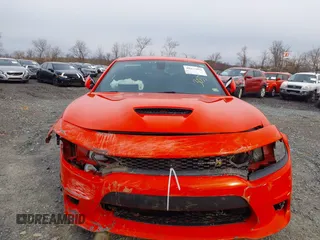 2020 Dodge Charger Scat Pack Widebody z VIN 2C3CDXGJ7LH247951, wystawiony jako IAAI lot #41873033 z przebiegiem 31 280 mil mil oraz . Historia ofert i sprzedaży dostępna na DreamBid. Obrazek 13.
