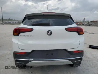 2021 Buick Encore GX Essence with VIN KL4MMFSL1MB144354, listed as a Copart auction lot 48575195 with 90,974 mi miles and Salvage title. Bid and sale history available at DreamBid. Image 6.