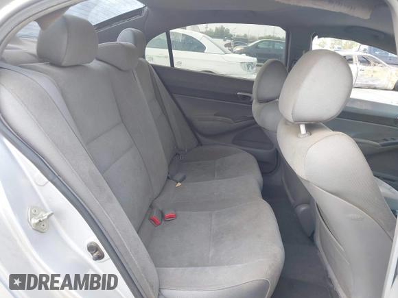 2006 Honda Civic LX with VIN 1HGFA165X6L144003, listed as a IAAI auction lot 42115624 with 310,261 mi miles and . Bid and sale history available at DreamBid. Image 8.