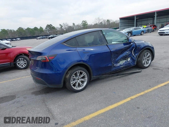 2023 Tesla Model Y Long Range with VIN 7SAYGDEE7PA194998, listed as a IAAI auction lot 41787170 with 16,221 mi miles and . Bid and sale history available at DreamBid. Image 4.