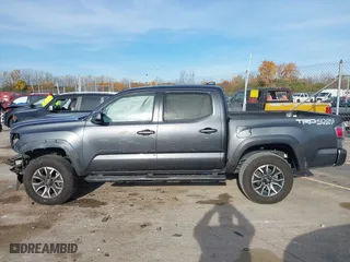 2023 Toyota Tacoma 4WD SR with VIN 3TMCZ5AN8PM574766, listed as a IAAI auction lot 40663003 with 43,978 mi miles. Bid and sale history available at carsss.com. Image 15.