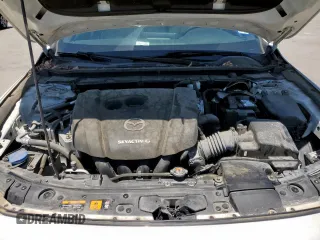 2019 Mazda 3 z VIN JM1BPAJM3K1131108, wystawiony jako Copart lot #57911165 z przebiegiem 65 641 mil mil oraz Szkoda całkowita • Salvage title. Historia ofert i sprzedaży dostępna na DreamBid. Obrazek 11.