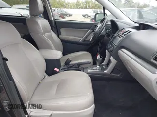 2014 Subaru Forester 2.5i Limited with VIN JF2SJAJC1EH517094, listed as a IAAI auction lot 41953103 with 145,122 mi miles. Bid and sale history available at carsss.com. Image 5.