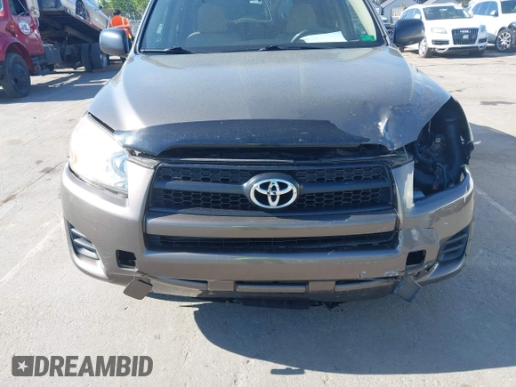 2009 Toyota RAV4 with VIN JTMZF33V395009905, listed as a IAAI auction lot 41881121 with 117,584 mi miles. Bid and sale history available at carsss.com. Image 6.