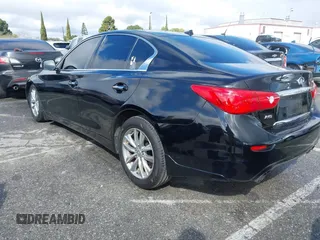 2014 Infiniti Q50 Premium with VIN JN1BV7AR2EM685587, listed as a IAAI auction lot 41777563 with 134,443 mi miles and . Bid and sale history available at DreamBid. Image 3.