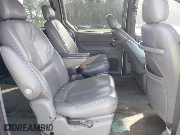 1999 Chrysler Town & Country LXi with VIN 1C4GP54L3XB899589, listed as a IAAI auction lot 41792430 with 248,850 mi miles. Bid and sale history available at carsss.com. Image 8.