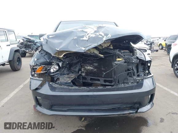 2014 Ram 1500 Express with VIN 1C6RR6FT5ES416548, listed as a IAAI auction lot 41518392 with 127,336 mi miles and . Bid and sale history available at DreamBid. Image 12.
