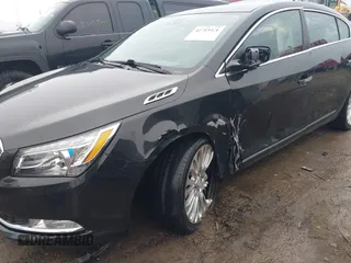 2014 Buick LaCrosse Premium II with VIN 1G4GF5G39EF305104, listed as a IAAI auction lot 41715121 with 81,341 mi miles and . Bid and sale history available at DreamBid. Image 6.
