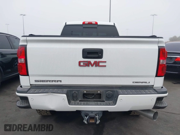 2015 GMC Sierra 2500HD Denali with VIN 1GT120E85FF681680, listed as a IAAI auction lot 42081711 with 67,676 mi miles and . Bid and sale history available at DreamBid. Image 16.