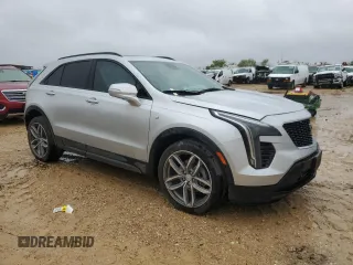 2022 Cadillac XT4 FWD Sport with VIN 1GYFZER47NF111047, listed as a Copart auction lot 50958135 with 14,448 mi miles and Salvage Title. Bid and sale history available at carsss.com. Image 4.