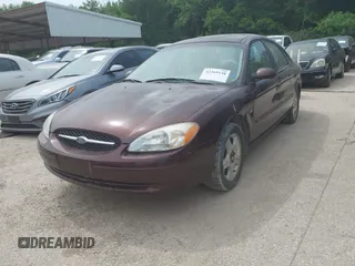 2000 Ford Taurus SEL z VIN 1FAFP56S2YA183814, wystawiony jako IAAI lot #42269148 z przebiegiem 210 990 mil mil oraz . Historia ofert i sprzedaży dostępna na DreamBid. Obrazek 2.