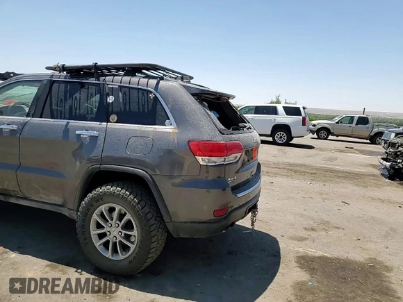2014 Jeep Grand Cherokee Limited with VIN 1C4RJFBM3EC384398, listed as a Copart auction lot 57703835 with 153,255 mi miles and Salvage title. Bid and sale history available at DreamBid. Image 14.