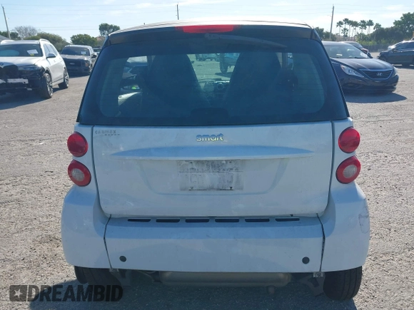 2013 Smart fortwo Pure z VIN WMEEJ3BA5DK619182, wystawiony jako IAAI lot #41857040 z przebiegiem 84 840 mil mil oraz . Historia ofert i sprzedaży dostępna na DreamBid. Obrazek 17.