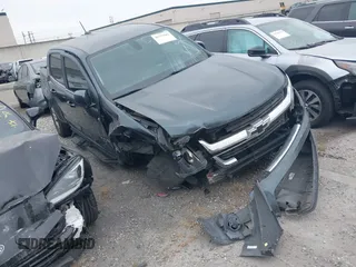 2019 Chevrolet Colorado 2WD LT z VIN 1GCGSCENXK1172564, wystawiony jako IAAI lot #41571842 z przebiegiem 82 816 mil mil oraz . Historia ofert i sprzedaży dostępna na DreamBid. Obrazek 1.