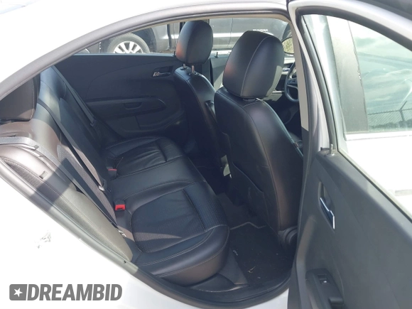 2016 Chevrolet Sonic LTZ z VIN 1G1JE5SBXG4160349, wystawiony jako IAAI lot #41725051 z przebiegiem 115 882 mil mil oraz . Historia ofert i sprzedaży dostępna na DreamBid. Obrazek 8.