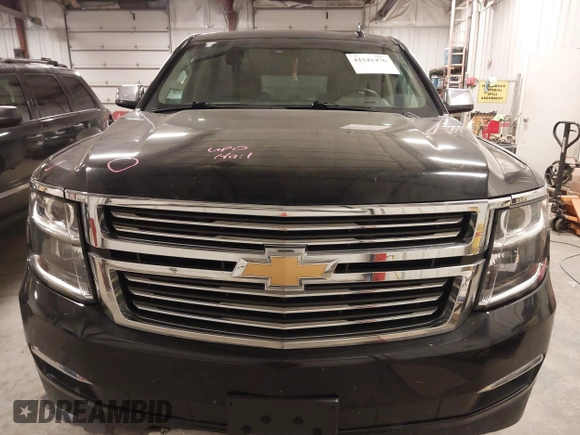 2017 Chevrolet Suburban Premier z VIN 1GNSKJKC0HR250854, wystawiony jako IAAI lot #41541476 z przebiegiem 128 231 mil mil oraz . Historia ofert i sprzedaży dostępna na DreamBid. Obrazek 12.