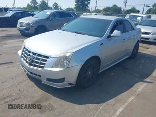2012 Cadillac CTS with VIN 1G6DC5E51C0156873, listed as a IAAI auction lot 42587421 with 169,006 mi miles and . Bid and sale history available at DreamBid. Image 2.