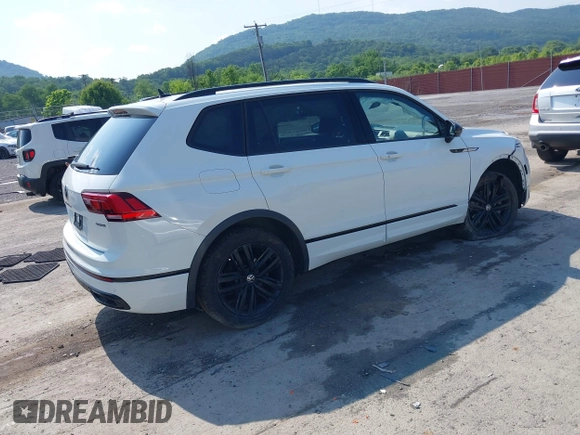 2022 Volkswagen Tiguan SE R-Line Black with VIN 3VV8B7AX0NM007523, listed as a IAAI auction lot 42457688 with 39,084 mi miles and . Bid and sale history available at DreamBid. Image 4.