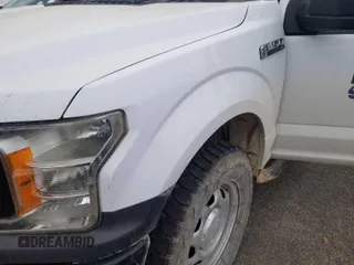 2019 Ford F-150 XL with VIN 1FTFW1E5XKKC10812, listed as a IAAI auction lot 42008590 with 135,101 mi miles. Bid and sale history available at carsss.com. Image 1.
