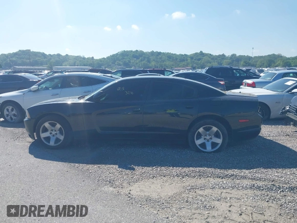 2014 Dodge Charger Police with VIN 2C3CDXAT9EH261962, listed as a IAAI auction lot 42183216 with 166,916 mi miles and . Bid and sale history available at carsss.com. Image 14.