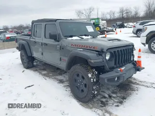 2021 Jeep Gladiator Mojave with VIN 1C6JJTEG8ML558909, listed as a IAAI auction lot 41343666 with 48,050 mi miles and . Bid and sale history available at DreamBid. Image 1.