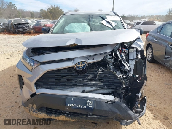 2021 Toyota RAV4 Hybrid LE z VIN JTMLWRFV8MD129136, wystawiony jako IAAI lot #41644636 z przebiegiem 82 253 mil mil oraz . Historia ofert i sprzedaży dostępna na DreamBid. Obrazek 6.