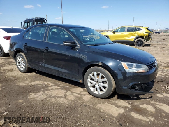 2012 Volkswagen Jetta SE with VIN 3VWDP7AJ4CM346564, listed as a Copart auction lot 52766775 with 157,384 mi miles and Salvage title. Bid and sale history available at DreamBid. Image 4.