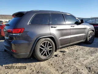 2021 Jeep Grand Cherokee Trailhawk with VIN 1C4RJFLG5MC627975, listed as a Copart auction lot 83080204 with 83,642 mi miles and Salvage Title. Bid and sale history available at carsss.com. Image 3.