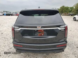 2023 Cadillac XT6 AWD Sport z VIN 1GYKPGRS6PZ126039, wystawiony jako Copart lot #55948605 z przebiegiem 39 966 mil mil oraz Szkoda całkowita • Salvage title. Historia ofert i sprzedaży dostępna na DreamBid. Obrazek 6.