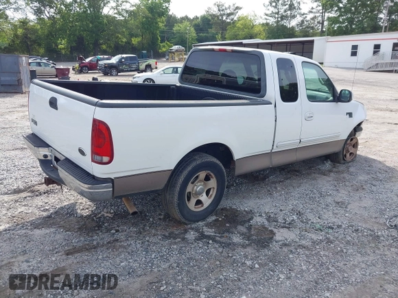 2001 Ford F-150 XL z VIN 1FTRX17WX1NA20036, wystawiony jako IAAI lot #42231600 z przebiegiem 181 549 mil mil oraz . Historia ofert i sprzedaży dostępna na DreamBid. Obrazek 4.
