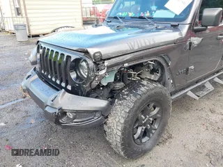 2021 Jeep Wrangler Unlimited Willys с VIN 1C4HJXDG2MW646904, выставлен на аукционе IAAI как лот 42267506 с пробегом 55 530 миль миль и . История ставок и продаж доступна на DreamBid. Изображение 6.