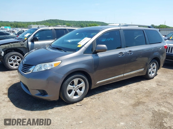 2015 Toyota Sienna LE AAS with VIN 5TDKK3DC4FS617903, listed as a IAAI auction lot 42390155 with 151,975 mi miles and . Bid and sale history available at DreamBid. Image 2.