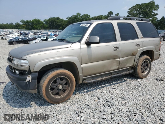 2002 Chevrolet Tahoe Z71 z VIN 1GNEK13Z02R269752, wystawiony jako Copart lot #59030705 z przebiegiem 342 433 mil mil oraz Szkoda całkowita • Salvage title. Historia ofert i sprzedaży dostępna na DreamBid. Obrazek 1.