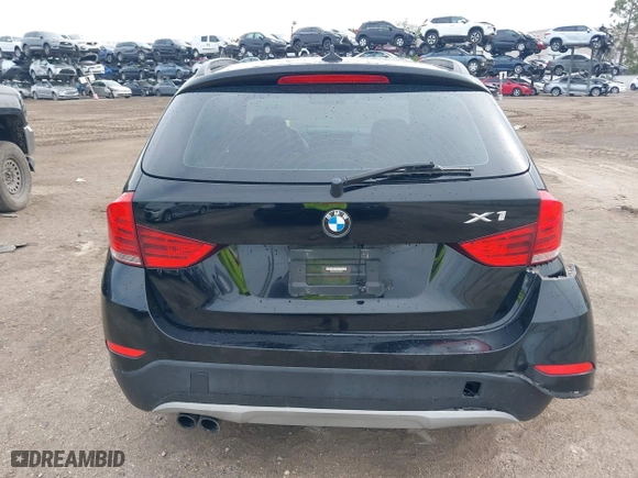 2014 BMW X1 sDrive28i with VIN WBAVM1C54EVW46561, listed as a IAAI auction lot 41880387 with 125,096 mi miles. Bid and sale history available at carsss.com. Image 16.