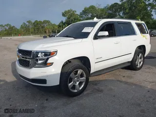 2016 Chevrolet Tahoe LT with VIN 1GNSCBKC5GR409482, listed as a IAAI auction lot 41918131 with 222,579 mi miles. Bid and sale history available at carsss.com. Image 2.
