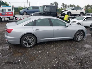 2023 Audi A6 Premium z VIN WAUD3BF27PN068058, wystawiony jako IAAI lot #42179522 z przebiegiem 7 869 mil mil oraz . Historia ofert i sprzedaży dostępna na DreamBid. Obrazek 13.