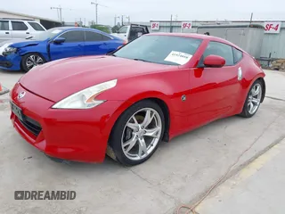 2009 Nissan 370Z Touring z VIN JN1AZ44E79M404171, wystawiony jako IAAI lot #41924058 z przebiegiem 75 940 mil mil oraz . Historia ofert i sprzedaży dostępna na DreamBid. Obrazek 2.