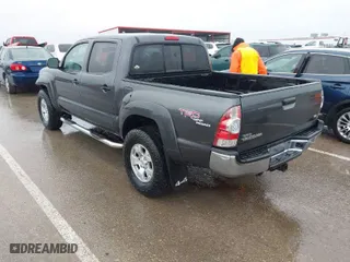 2011 Toyota Tacoma with VIN 3TMLU4ENXBM062437, listed as a IAAI auction lot 41458901 with 182,275 mi miles. Bid and sale history available at carsss.com. Image 3.