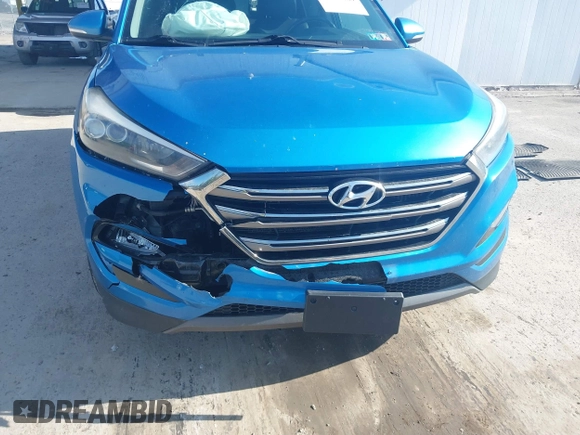 2016 Hyundai Tucson Eco with VIN KM8J3CA24GU054350, listed as a IAAI auction lot 41983769 with 132,424 mi miles. Bid and sale history available at carsss.com. Image 6.