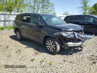 2020 Honda Pilot EX z VIN 5FNYF6H31LB056859, wystawiony jako Copart lot #54798455 z przebiegiem 51 884 mil mil oraz Szkoda całkowita • Salvage title. Historia ofert i sprzedaży dostępna na DreamBid. Obrazek 4.