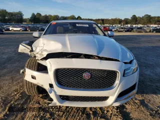2016 Jaguar XF 35t Prestige with VIN SAJBE4BV6GCY07059, listed as a Copart auction lot 80450974 with 65,981 mi miles and Salvage Title. Bid and sale history available at carsss.com. Image 5.
