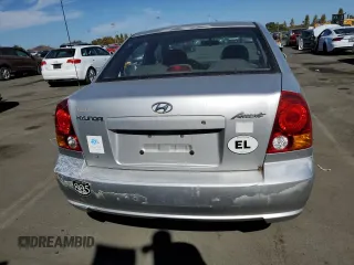 2003 Hyundai Accent GL with VIN KMHCG45CX3U488238, listed as a Copart auction lot 74399014 with 130,915 mi miles and Clean Title. Bid and sale history available at carsss.com. Image 6.
