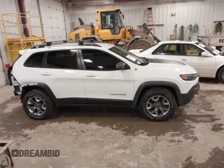 2019 Jeep Cherokee Trailhawk with VIN 1C4PJMBX4KD390061, listed as a IAAI auction lot 42007112 with 72,227 mi miles and . Bid and sale history available at DreamBid. Image 13.