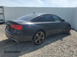 2014 Audi S6 Prestige z VIN WAUF2AFC9EN133262, wystawiony jako Copart lot #48524255 z przebiegiem 120 103 mil mil oraz Tytuł czysty. Historia ofert i sprzedaży dostępna na DreamBid. Obrazek 3.