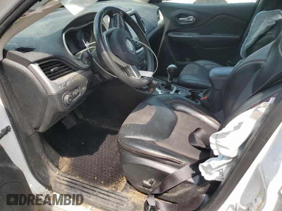 2015 Jeep Cherokee Trailhawk with VIN 1C4PJMBS8FW717950, listed as a Copart auction lot 60321625 with 155,210 mi miles and Salvage title. Bid and sale history available at DreamBid. Image 7.