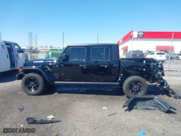 2023 Jeep Gladiator Freedom with VIN 1C6HJTAG1PL526229, listed as a IAAI auction lot 41972084 with 26,021 mi miles. Bid and sale history available at carsss.com. Image 14.