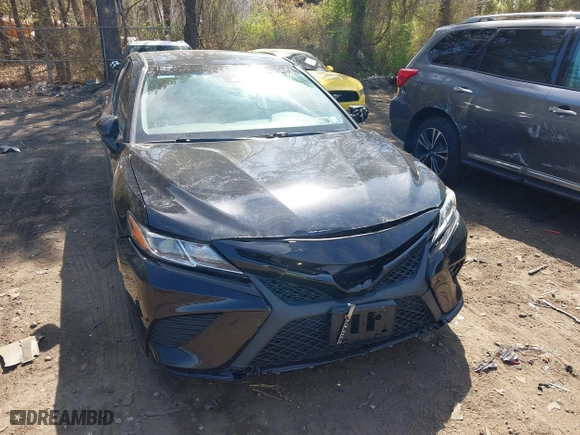 2018 Toyota Camry LE with VIN 4T1B11HK9JU115557, listed as a IAAI auction lot 42087452 with 185,752 mi miles. Bid and sale history available at carsss.com. Image 12.