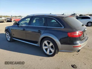 2014 Audi allroad Premium Plus with VIN WA1UFAFL8EA017728, listed as a Copart auction lot 75241264 with 114,283 mi miles and Salvage Title. Bid and sale history available at carsss.com. Image 2.