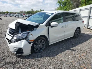 2025 Honda Odyssey Touring с VIN 5FNRL6H87SB001792, выставлен на аукционе Copart как лот 51049255 с пробегом Не указан миль и Списание • Salvage title. История ставок и продаж доступна на DreamBid. Изображение 1.
