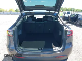 2022 Tesla Model Y Long Range with VIN 7SAYGDEE7NF426404, listed as a IAAI auction lot 42040490 with 39,635 mi miles and . Bid and sale history available at carsss.com. Image 19.